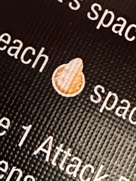 extreme close-up of an icon from a card in Disney Sidekicks