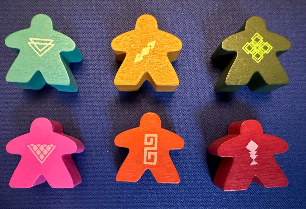 6 meeples, one for each player, in 6 colors and an icon screen printed on each.