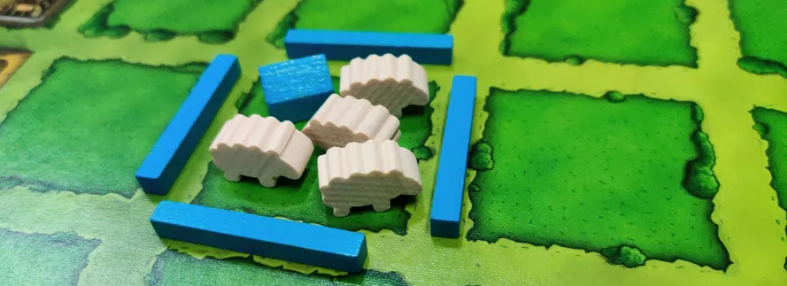 Sheep and fences on Agricola board